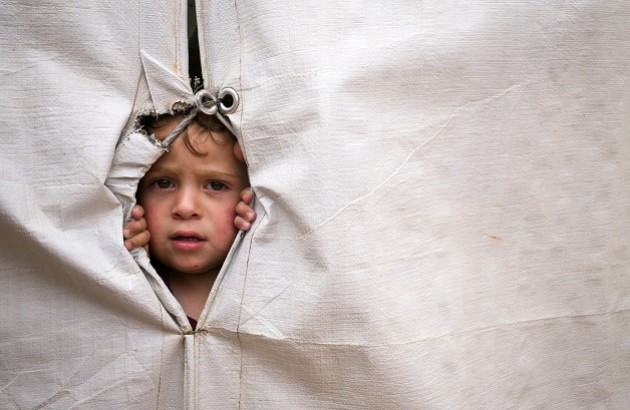 کودک آوارۀ سوری در کمپ سازمان ملل