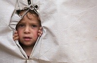 کودک آوارۀ سوری در کمپ سازمان ملل.